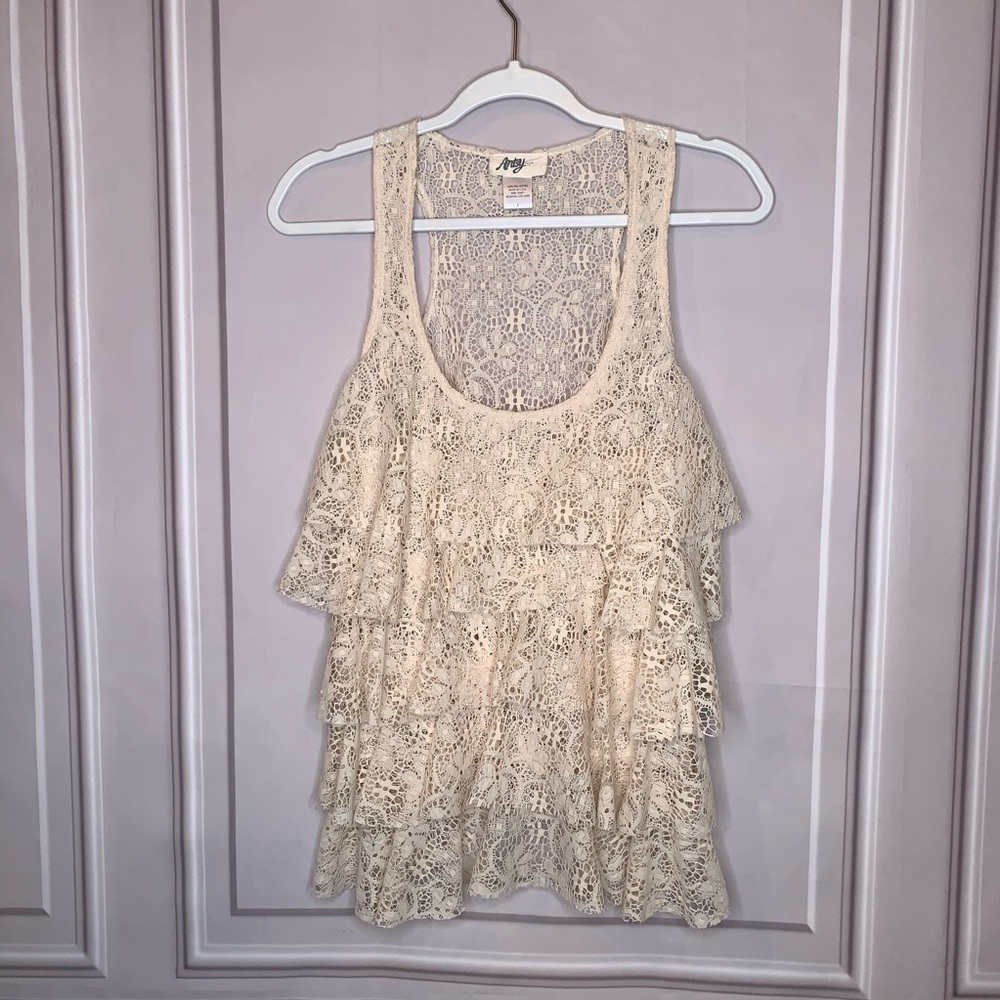 Artsy, tiered lace top. Size L